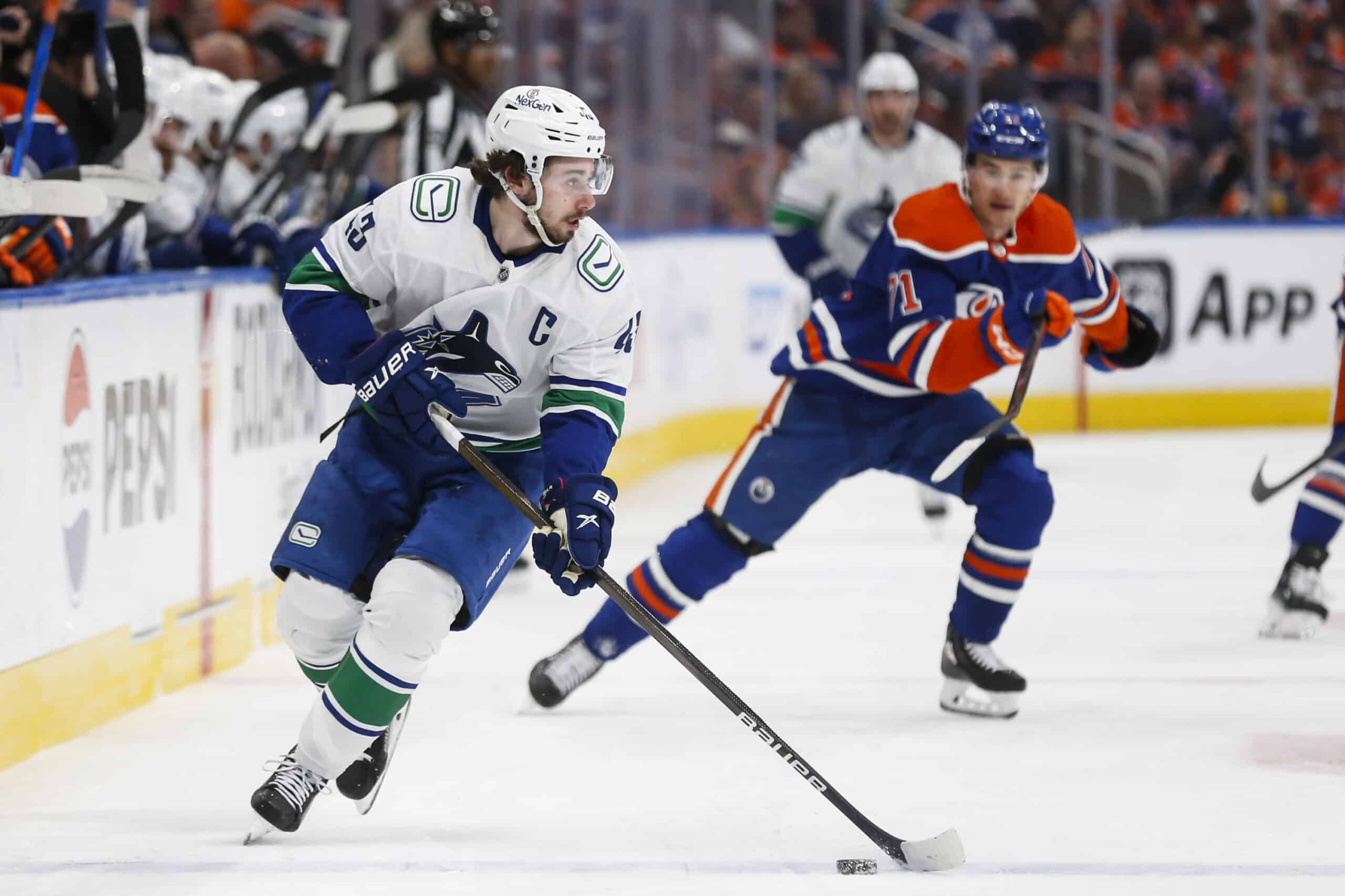 EDMONTON, CANADA - MAY 18:  Quinn Hughes #43 of the Vancouver Canucks skates against the Edmonton Oilers during the second period of Game Six in the Second Round of the 2024 Stanley Cup Playoffs at Rogers Place on May 18, 2024 in Edmonton, Canada. (Photo by Codie McLachlan/Getty Images)