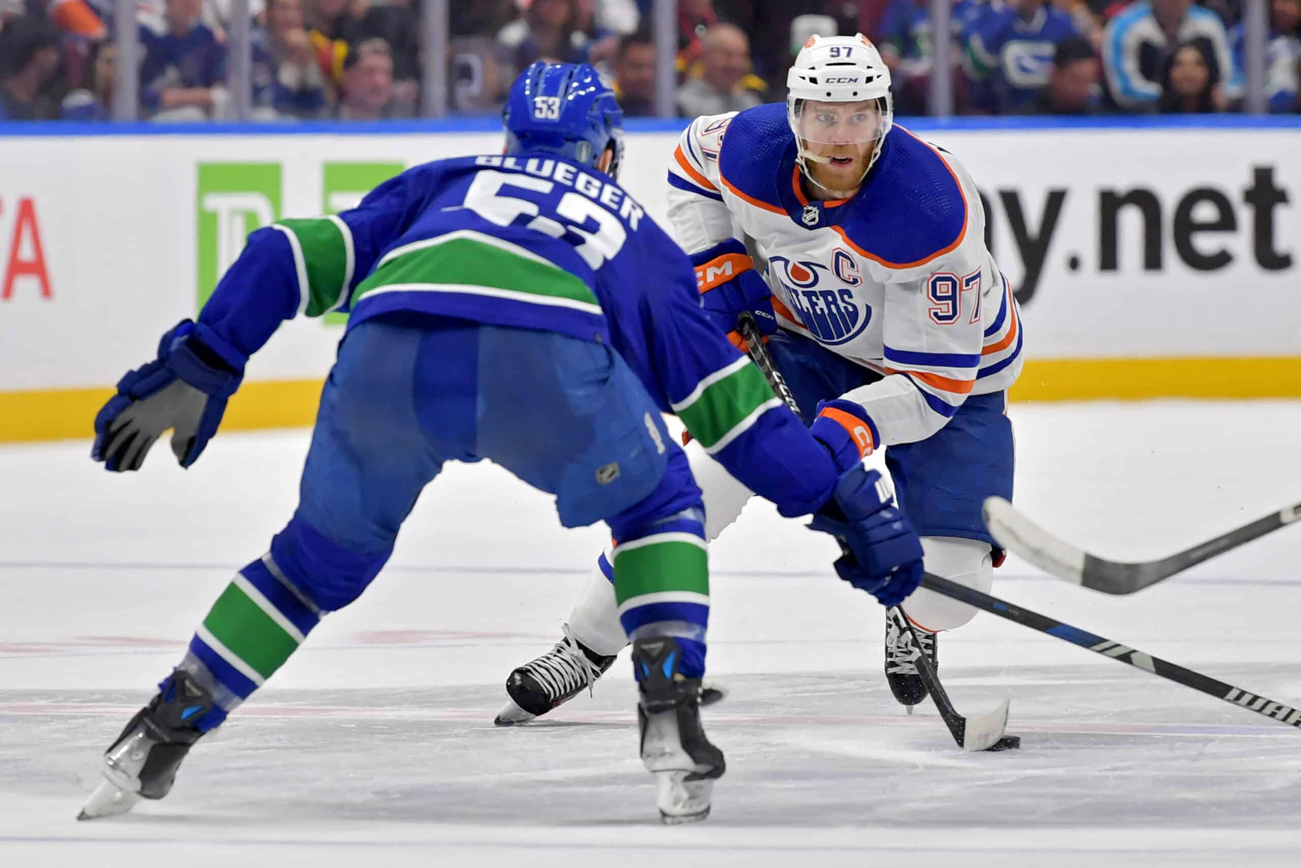 Connor McDavid #97 of the Edmonton Oilers is the NHL awards odds favourite, skates against Teddy Blueger #53 of the Vancouver Canucks during the second period in Game Seven of the Second Round of the 2024 Stanley Cup Playoffs at Rogers Arena on May 20, 2024 in Vancouver, British Columbia. 