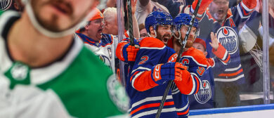 Edmonton Oilers Defenceman Evan Bouchard (2) and Edmonton Oilers Center Connor McDavid (97) celebrate a game tying goal in the first period of game three of the Western Conference Final Round Edmonton Oilers game versus the Dallas Stars on May 29, 2024 at Rogers Place in Edmonton, AB.