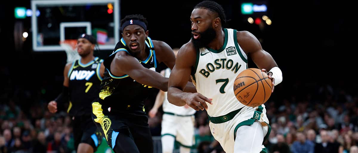 Boston Celtics SG Jaylen Brown drives to the basket in the first quarter. The Celtics beat the Indiana Pacers, 129-124. (NBA Betting)