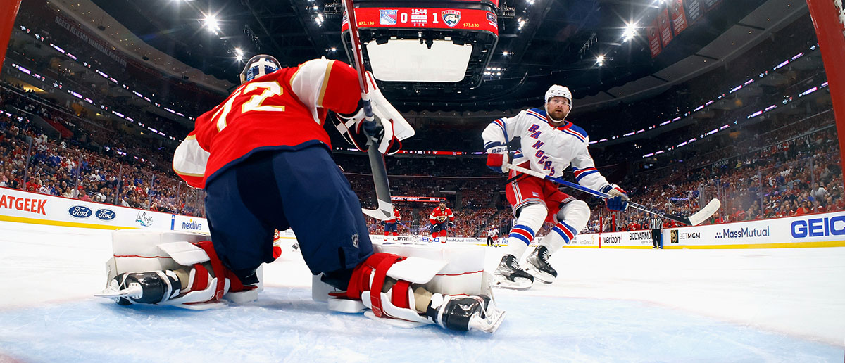 Alexis Lafreniere #13 of the New York Rangers scores a first period goal against Sergei Bobrovsky #72 of the Florida Panthers in Game Three of the Eastern Conference Final of the 2024 Stanley Cup Playoffs at Amerant Bank Arena on May 26, 2024 in Sunrise, Florida.