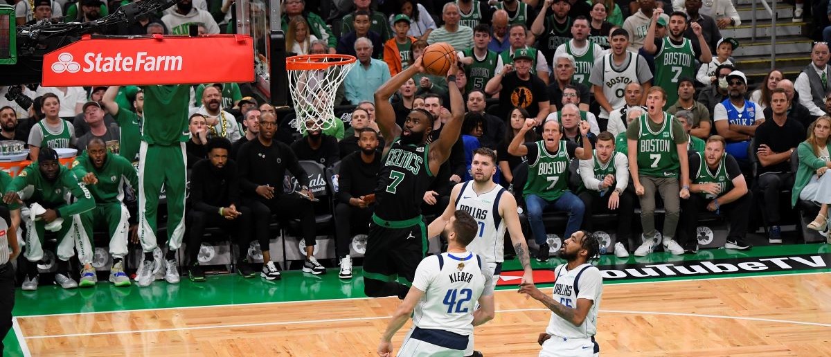 Jaylen Brown #7 of the Boston Celtics dunks the ball during the game against the Dallas Mavericks during Game 2 of the 2024 NBA Finals on June 9, 2024 at the TD Garden in Boston, Massachusetts