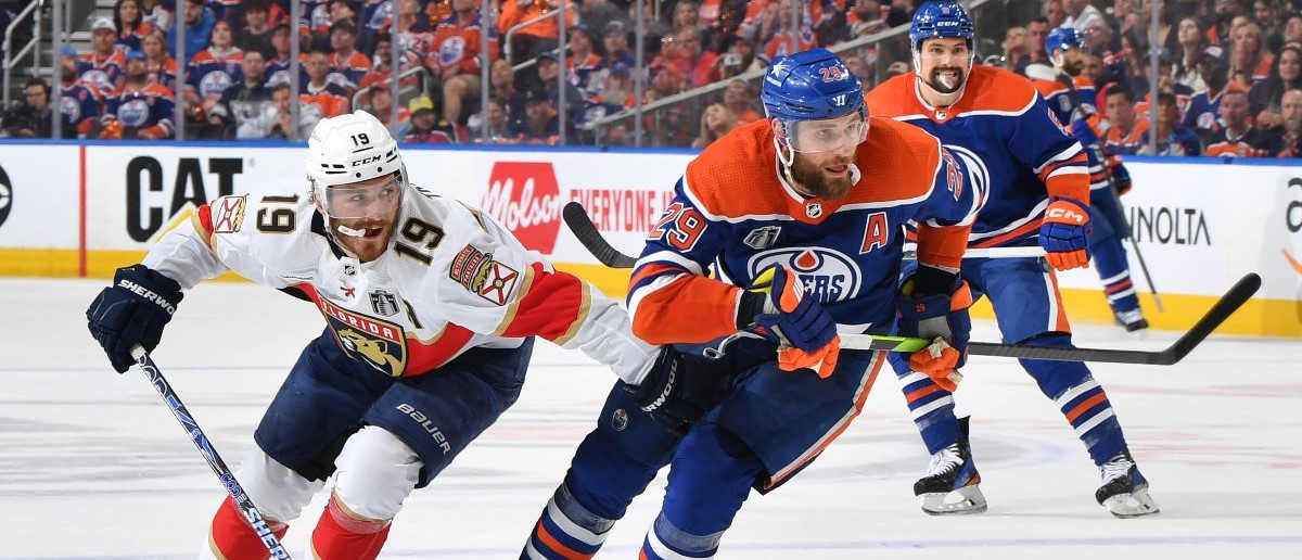 Leon Draisaitl #29 of the Edmonton Oilers skates against Matthew Tkachuk #19 of the Florida Panthers in Game Three of the 2024 Stanley Cup Final at Rogers Place on June 13, 2024, in Edmonton, Alberta, Canada