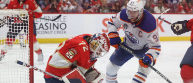 Goaltender Sergei Bobrovsky #72 of the Florida Panthers stops a shot as Connor McDavid #97 of the Edmonton Oilers looks for a rebound in Game One of the Final of the 2024 Stanley Cup Playoffs at the Amerant Bank Arena on June 8, 2024 in Sunrise, Florida