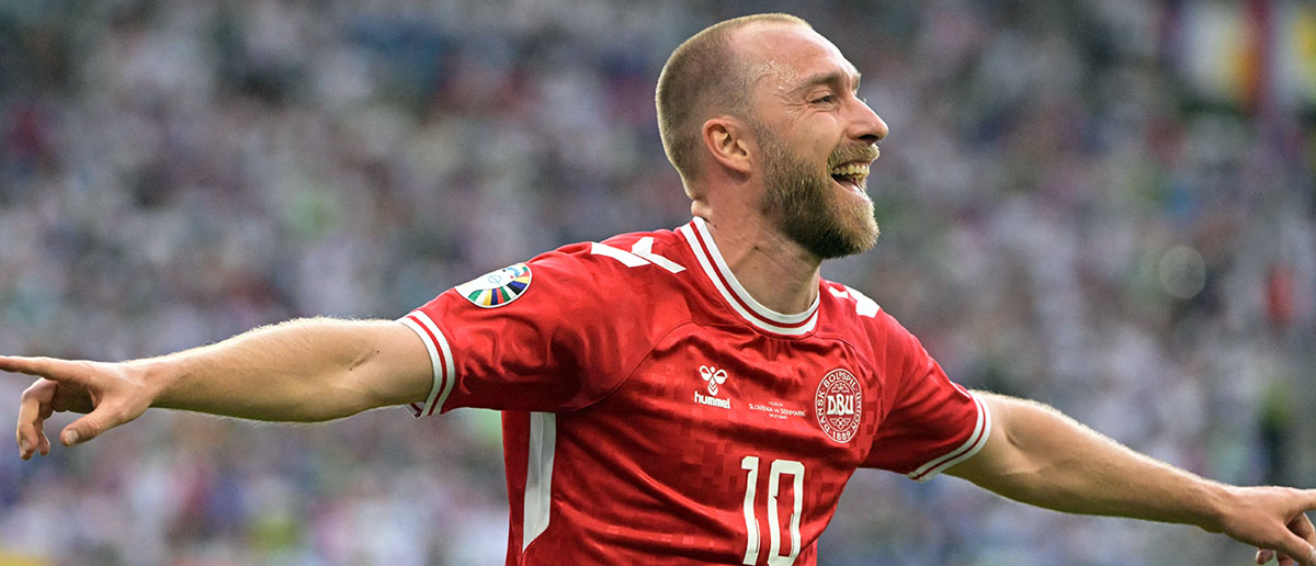 Denmark's midfielder #10 Christian Eriksen celebrates scoring his team's first goal during the UEFA Euro 2024 Group C football match between Slovenia and Denmark at the Stuttgart Arena in Stuttgart on June 16, 2024.