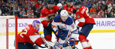The Florida Panthers converge to stop Connor McDavid #97 of the Edmonton Oilers during the first period at Amerant Bank Arena on November 20, 2023 in Sunrise, Florida.