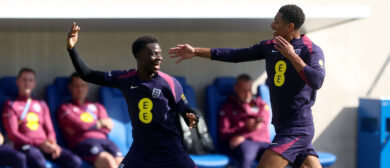Bukayo Saka and Jude Bellingham of England celebrate during a training session at Ernst-Abbe-Sportfeld on June 11, 2024 in Jena, Germany.