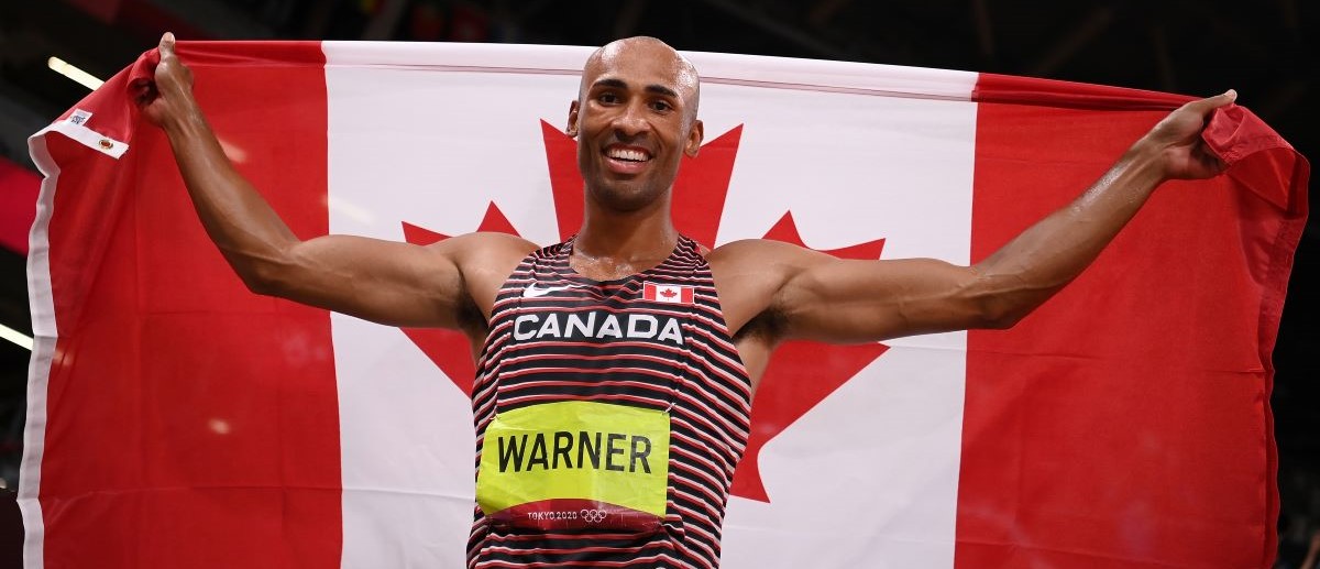 Damian Warner of Team Canada celebrates after winning the gold meldal in the Men's Decathlon on day thirteen of the Tokyo 2020 Olympic Games at Olympic Stadium on August 05, 2021 in Tokyo, Japan