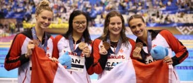Bronze medallists Summer Mcintosh, Margaret Macneil, Sophie Angus and Kylie Masse of Team Canada pose during the medal ceremony for the Women's 4 x 100m Medley Relay Final on day eight of the Fukuoka 2023 World Aquatics Championships at Marine Messe Fukuoka Hall A on July 30, 2023 in Fukuoka, Japan