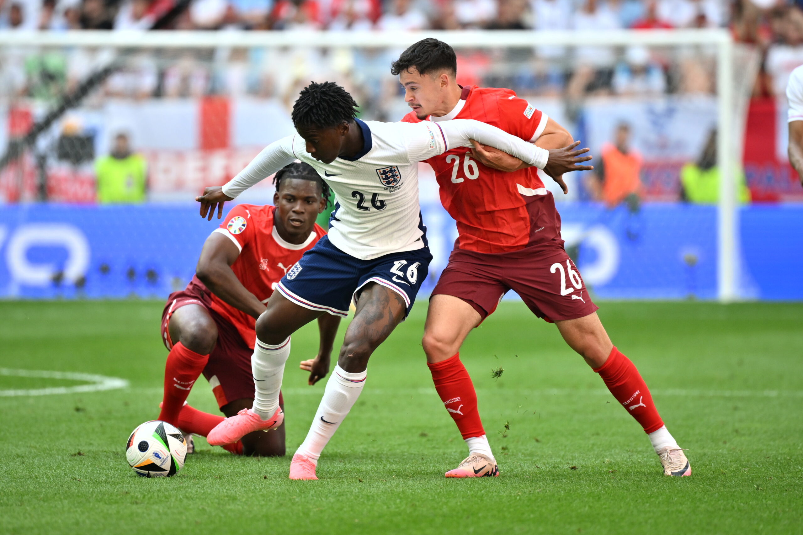 DUSSELDORF, GERMANY - JULY 06: England's Kobbie Mainoo, Central Midfield fights for the ball during the UEFA Euro 2024 quarter-final football match between England and Switzerland at the Duesseldorf Arena in Duesseldorf on July 6, 2024. (Photo by Gokhan Balci/Anadolu via Getty Images)