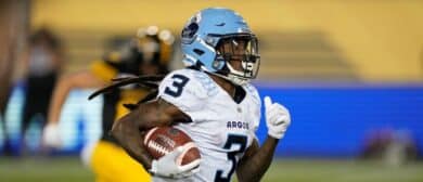 Janarion Grant #3 of the Toronto Argonauts returns a punt 96 yards for a touchdown against the Hamilton Tiger-Cats during the second half at Tim Hortons Field on July 20, 2024 in Hamilton, Canada.