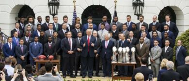 U.S. President Donald Trump (C) poses for a photo with the 2017 Super Bowl Champions the New England Patriots at the White House in Washington, United States on April 19, 2017