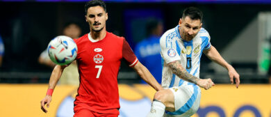 Stephen Eustaquio of Canada battles for possession with Lionel Messi of Argentina during the CONMEBOL Copa America group A match between Argentina and Canada at Mercedes-Benz Stadium on June 20, 2024 in Atlanta, Georgia