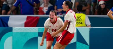 Vanessa Gilles of Canada (L) celebrating her goal with her teammates during the Women's Football Group A match between France and Canada on day two of the Olympic Games Paris 2024 at Stade Geoffroy-Guichard on July 28, 2024 in Saint-Etienne, France.