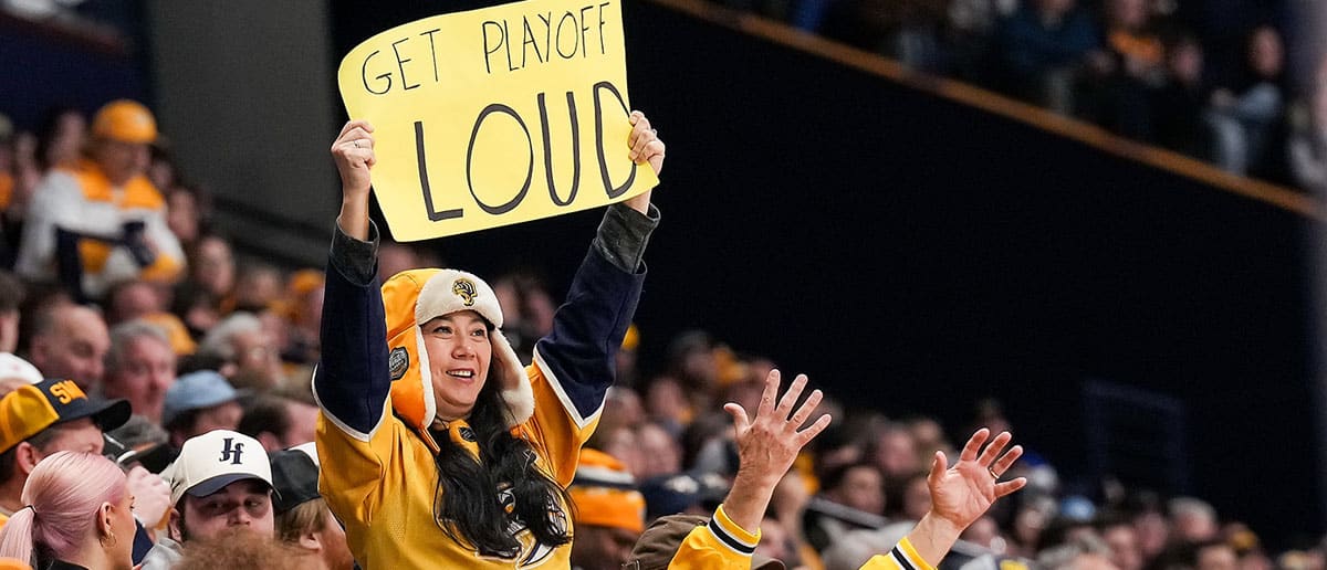 Nashville Predators fans cheer on their team during an NHL game against the St. Louis Blues at Bridgestone Arena on April 4, 2024 in Nashville, Tennessee.