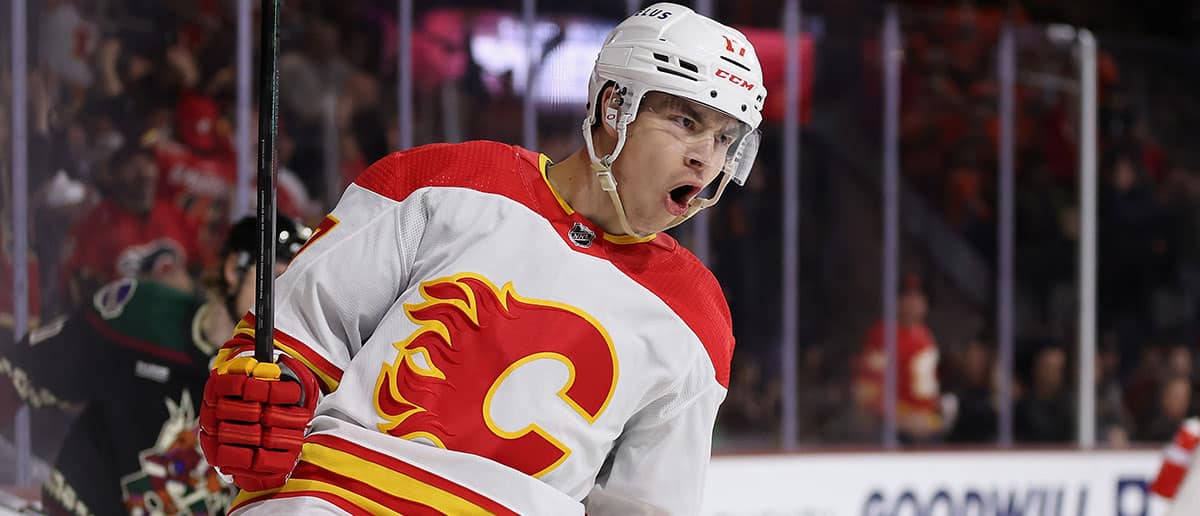 Yegor Sharangovich #17 of the Calgary Flames celebrates after scoring a a short-handed goal against the Arizona Coyotes during the first period of the NHL game at Mullett Arena on January 11, 2024 in Tempe, Arizona.