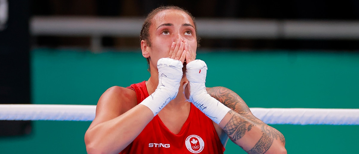 Tammara Thibeault (red) of Team Canada reacts after defeating Atheyna Bylon (blue) of Team Panama on Boxing - Women's 75kg final at Centro de Entrenamiento Olimpico on Day 7 of Santiago 2023 Pan Am Games on October 27, 2023 in Santiago, Chile.