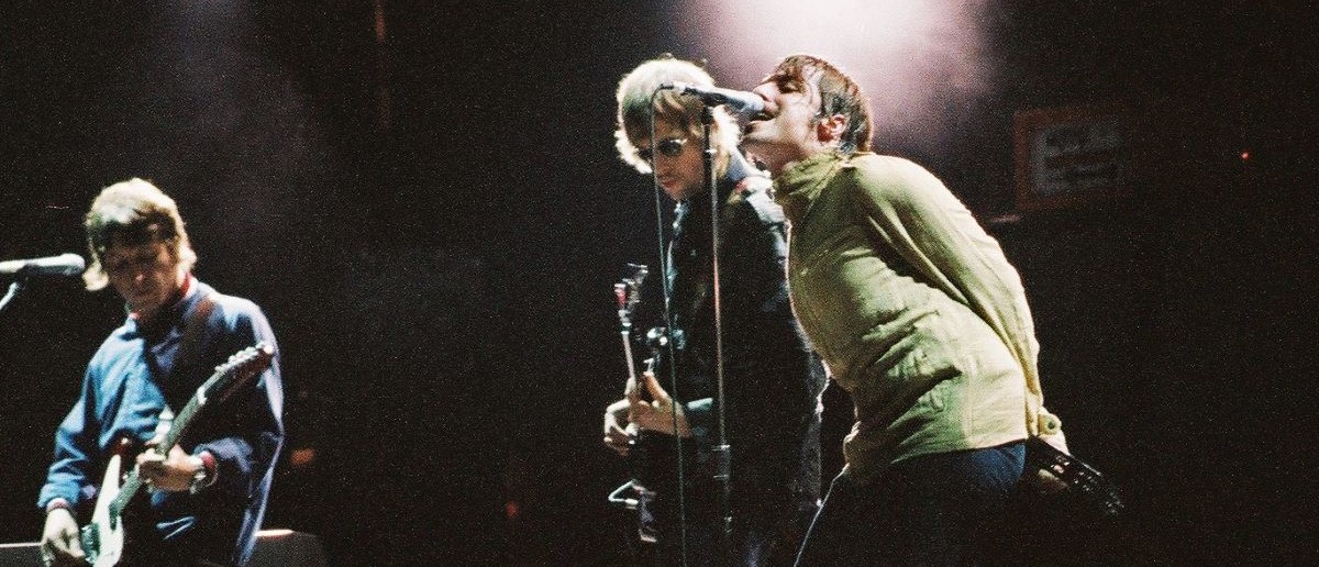 Liam Gallagher of Oasis performs on stage in Finsbury Park, on July 6th 2002, London, England.