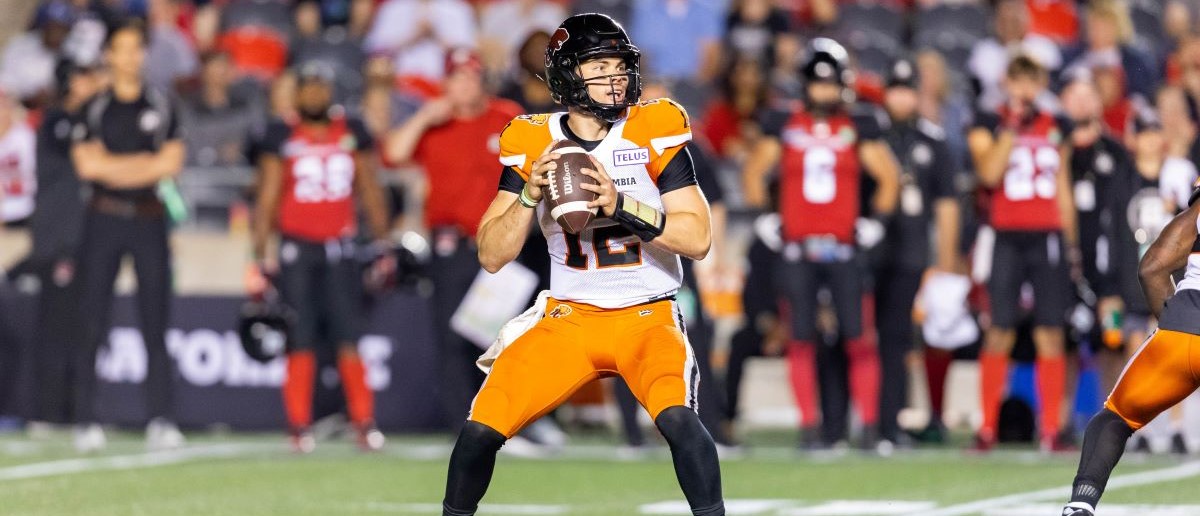 BC Lions quarterback Nathan Rourke (12) looks to pass the ball during Canadian Football League action between the BC Lions and Ottawa Redblacks on June 30, 2022, at TD Place at Lansdowne Park in Ottawa, ON, Canada.