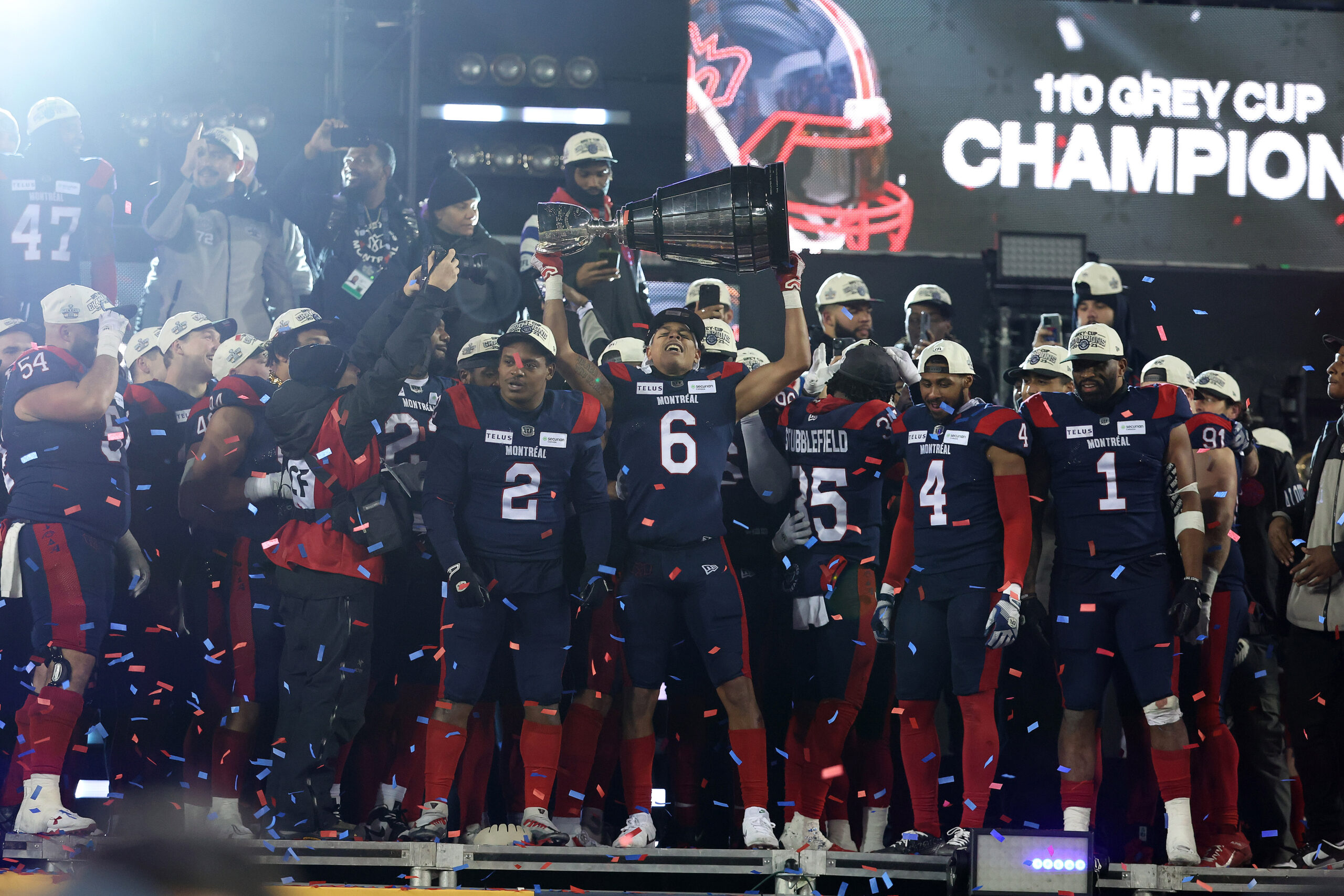 HAMILTON, ON - NOVEMBER 19 - Montreal Alouettes wide receiver Tyson Philpot (6) celebrates with the Grey Cup as the Montreal Alouettes beat the Winnipeg Blue Bombers 28-24 in the 110th edition of the Grey Cup  at Tim Horton's Field  in Hamilton, November 19, 2023.         (Steve Russell/Toronto Star via Getty Images)