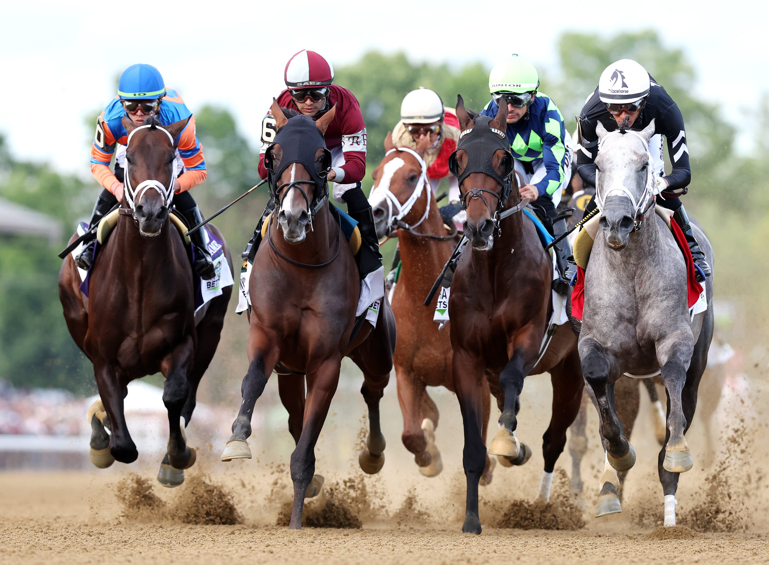 SARATOGA SPRINGS, NEW YORK - JUNE 08: The field of jockeys and horses start the 155th running of the Belmont Stakes at Saratoga Race Course on June 08, 2024 in Saratoga Springs, New York. (Photo by Al Bello/Getty Images)