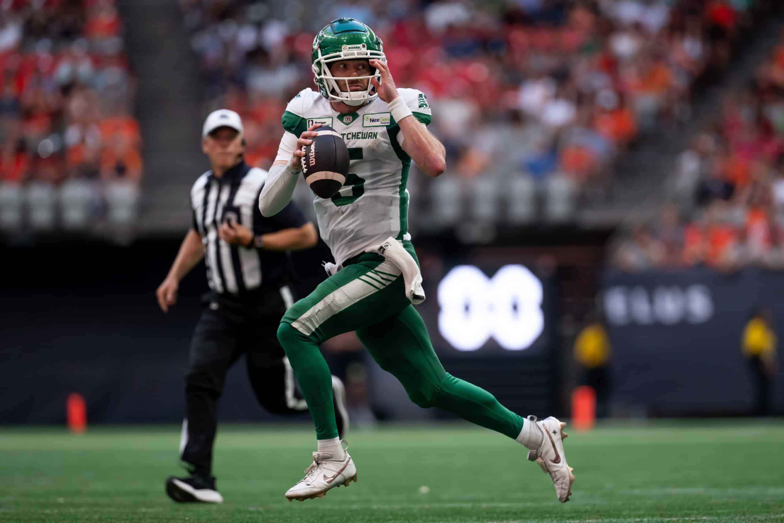 Part of our CFL teams list are the Saskatchewan Roughriders. In the photo: VANCOUVER, BC - JULY 13: Saskatchewan Roughriders quarterback Shea Patterson (5) runs the ball during the second half of a CFL football game between the Saskatchewan Roughriders and the BC Lions at BC Place Stadium in Vancouver B.C., on Saturday, July 13, 2024 (Photo by Ethan Cairns/Icon Sportswire via Getty Images)