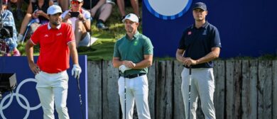 Scottie Scheffler of Team USA, Rory McIlroy of Team Ireland and Ludvig Åberg of Team Sweden stand as they are introduced on the first tee during the first round of the Olympic men's golf competition on day six of the Olympic Games Paris 2024 at Le Golf National on August 1, 2024 in Saint-Quentin-en-Yvelines, France