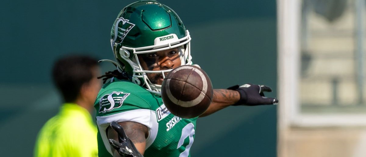 Mario Alford #2 of the Saskatchewan Roughriders catches a ball in warmup before the game between the Edmonton Elks and Saskatchewan Roughriders at Mosaic Stadium on August 3, 2024 in Regina, Canada.