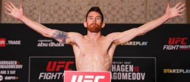 Cory Sandhagen poses on the scale during the UFC Fight Night official weigh-in at Hilton Abu Dhabi Yas Island on August 02, 2024 in Abu Dhabi, United Arab Emirates