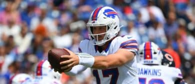 Josh Allen #17 of the Buffalo Bills looks to hand the ball off against the Chicago Bears during the first half of a preseason game at Highmark Stadium on August 10, 2024 in Orchard Park, New York