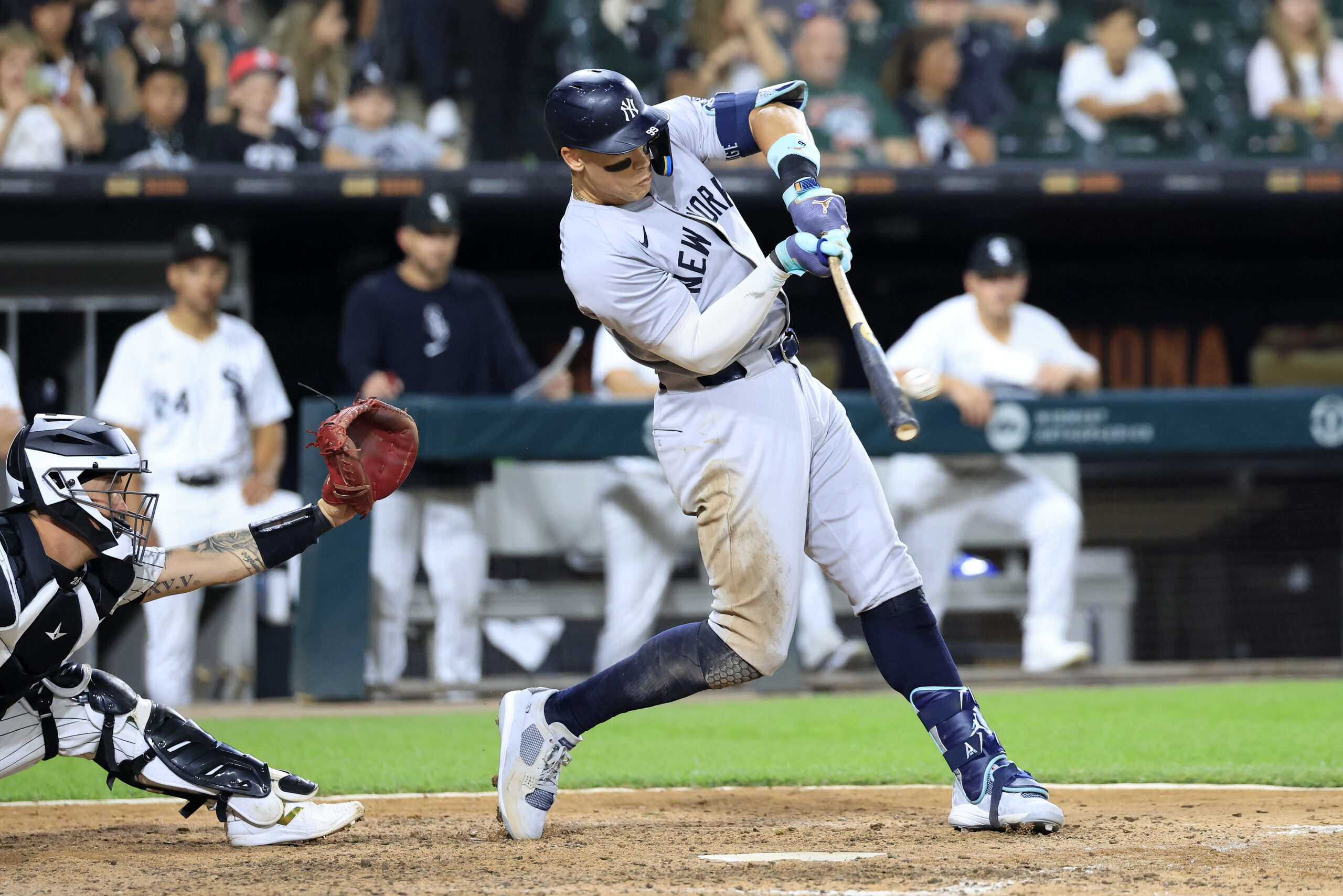 CHICAGO, ILLINOIS - AUGUST 14: Aaron Judge #99 of the New York Yankees hits a three-run home run, his 300th career home run, in the eighth inning against the Chicago White Sox at Guaranteed Rate Field on August 14, 2024 in Chicago, Illinois. 