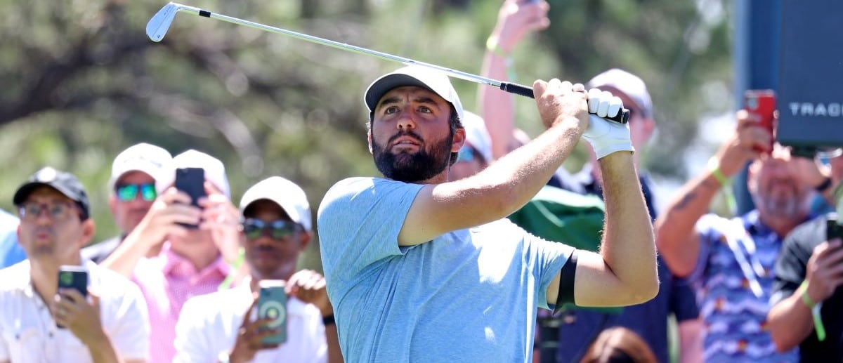 PGA golfer Scottie Scheffler plays his tee shot on the 16th hole during the first round of the PGA FedExCup BMW Championship on August 22nd, 2024, at Castle Pines Golf Club in Castle Rock, Colorado