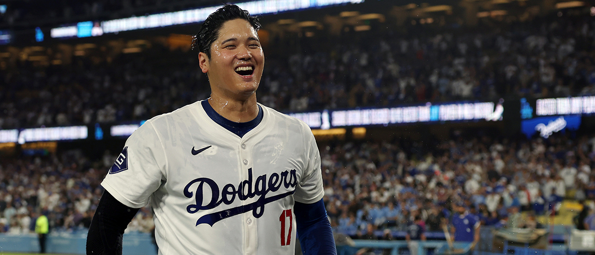 Shohei Ohtani #17 of the Los Angeles Dodgers celebrates after hitting a walk-off grand slam home run, his 40th home run of the season, against the Tampa Bay Rays at Dodger Stadium on August 23, 2024 in Los Angeles, California.