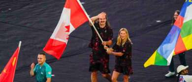 Summer McIntosh of Canada and Ethan Katzberg of Canada as Flagbearers for their country during the Closing Ceremony of the Olympic Games Paris 2024 at Stade de France on August 11, 2024 in Paris, France.