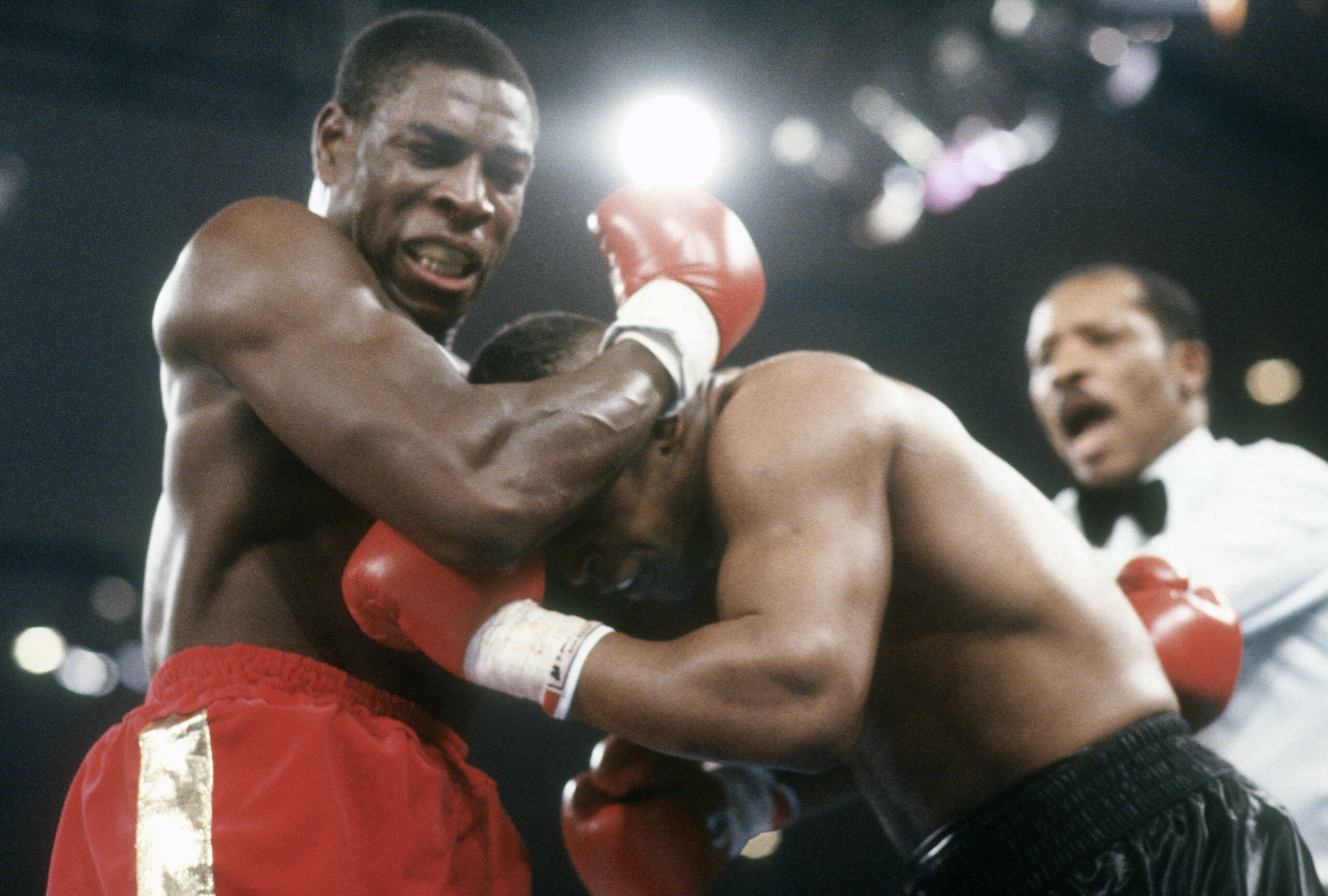 LAS VEGAS, NV - FEBRUARY 25: Mike Tyson and Frank Bruno fights for WBC, WBA and IBF Heavyweight titles on February 25, 1989 at the Las Vegas Hilton in Las Vegas, Nevada. Tyson won the fight with a 5th round TKO. (Photo by Focus on Sport/Getty Images)