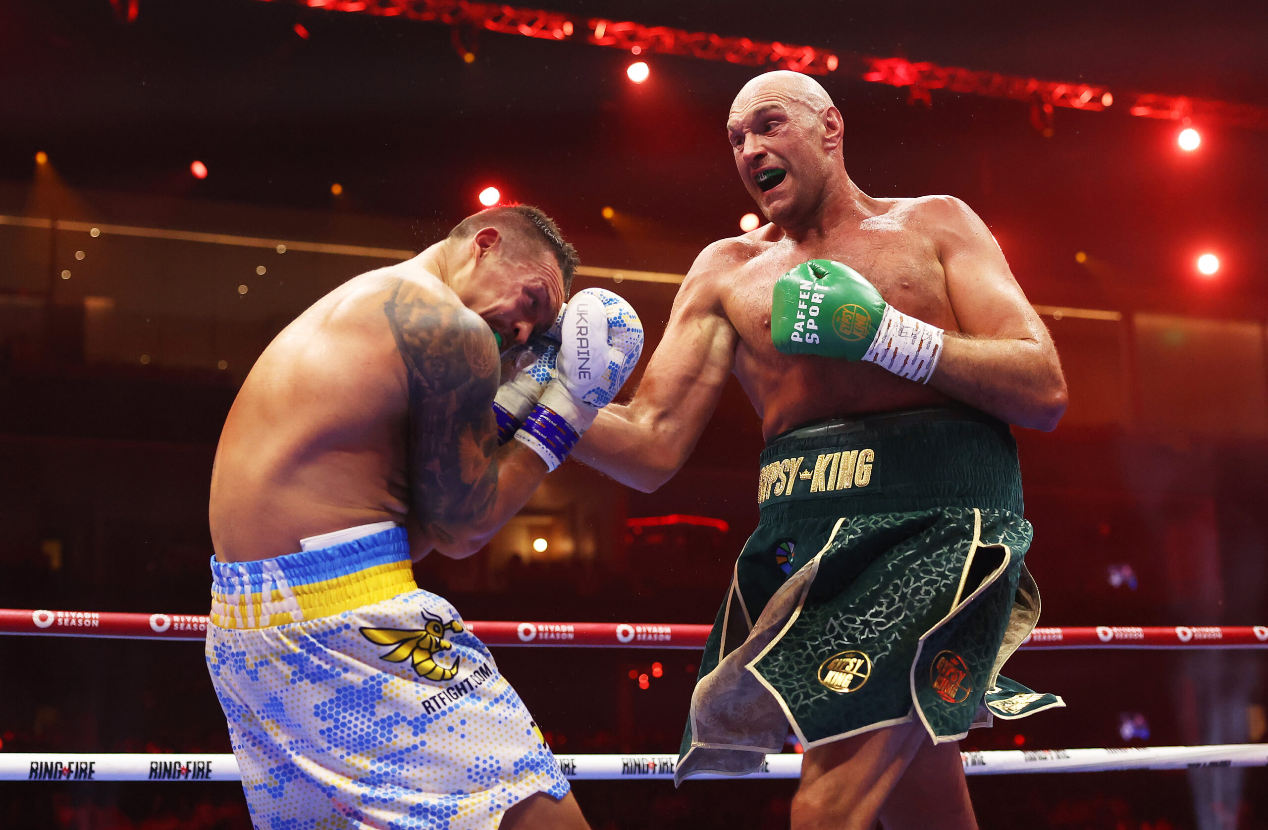 RIYADH, SAUDI ARABIA - MAY 18: Tyson Fury punches Oleksandr Usyk during the IBF, WBA, WBC, WBO and Undisputed Heavyweight titles' fight between Tyson Fury and Oleksandr Usyk at Kingdom Arena on May 18, 2024 in Riyadh, Saudi Arabia. (Photo by Richard Pelham/Getty Images)