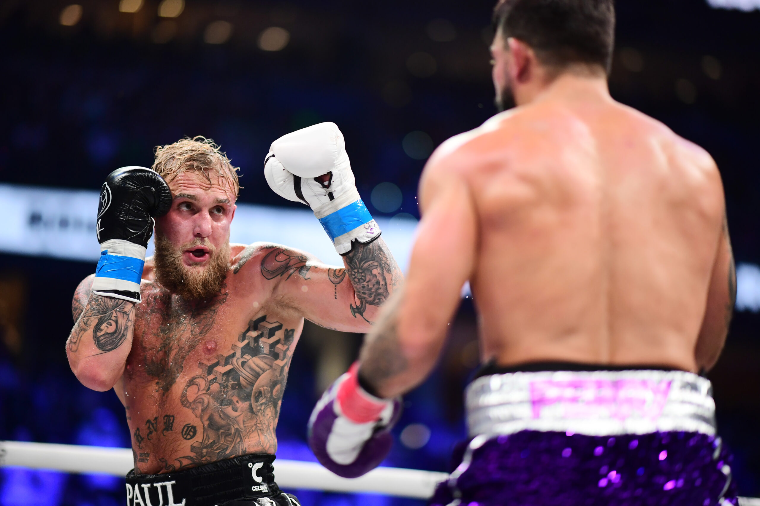 TAMPA, FLORIDA - JULY 20: Jake Paul fights against Mike Perry during their cruiserweight fight at Amalie Arena on July 20, 2024 in Tampa, Florida. (Photo by Julio Aguilar/Getty Images)