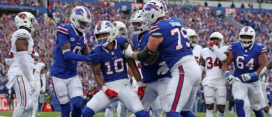 Khalil Shakir #10 celebrates with teammates after his receiving touchdown during the third quarter against the Arizona Cardinals at Highmark Stadium on September 08, 2024 in Orchard Park, New York