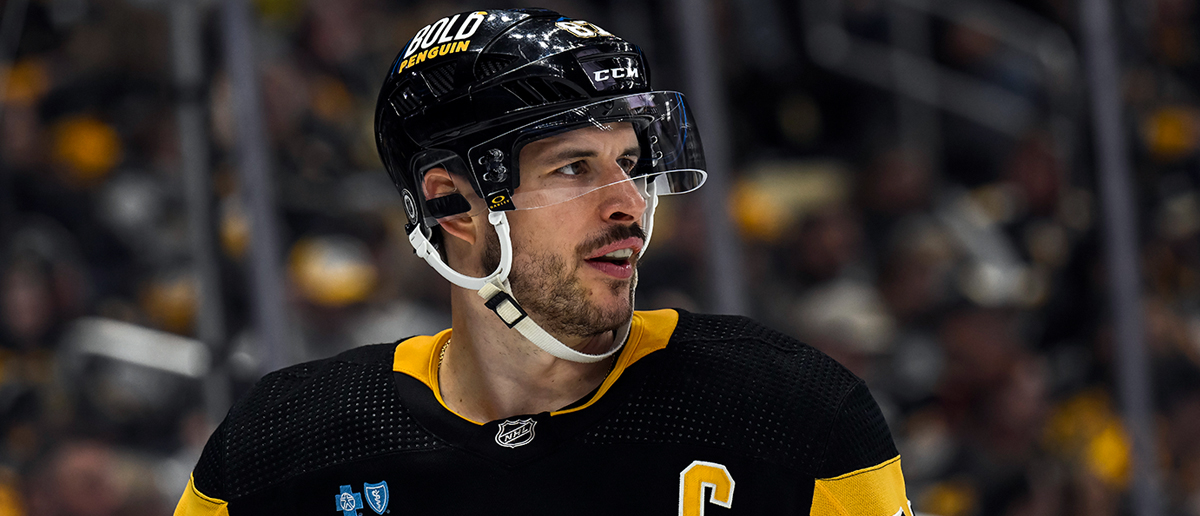 Pittsburgh Penguins center Sidney Crosby (87) looks on during the third period in the NHL game between the Pittsburgh Penguins and the Boston Bruins on April 13, 2024, at PPG Paints Arena in Pittsburgh, PA.