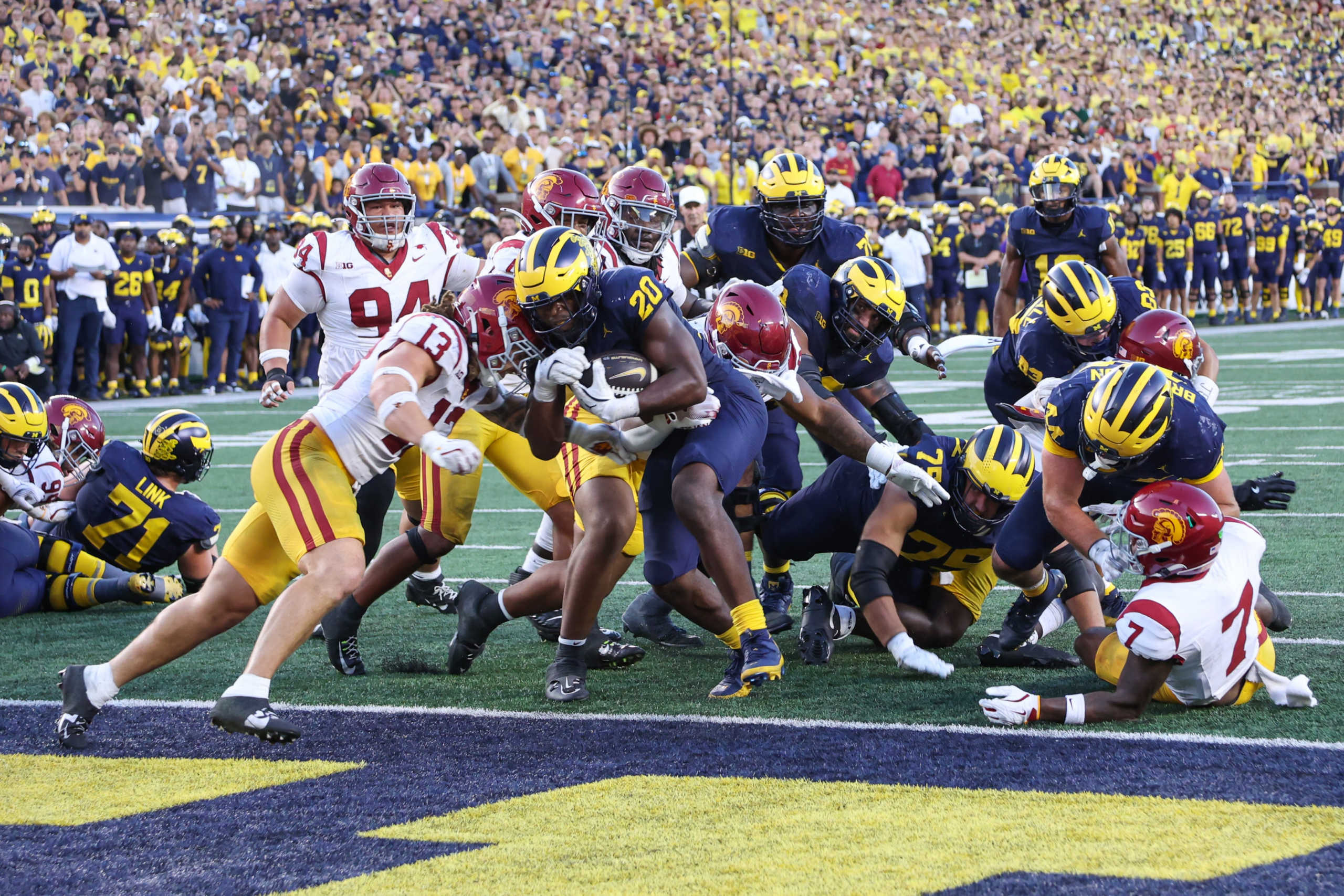 Michigan Wolverines running back Kalel Mullings runs with the ball into the end zone for the game-winning touchdown during the Big Ten Conference college football game between the USC Trojans and the Michigan Wolverines on September 21, 2024 at Michigan Stadium in Ann Arbor, Michigan.