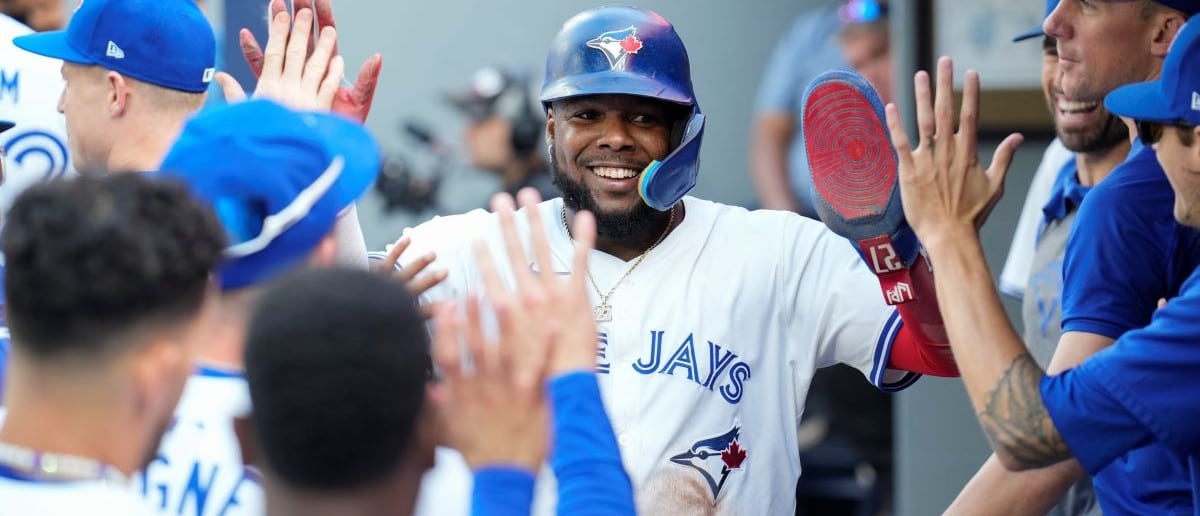 Vladimir Guerrero Jr. #27 of the Toronto Blue Jays celebrates scoring against the St. Louis during the seventh inning Cardinals in their MLB game at the Rogers Centre on September 14, 2024 in Toronto, Ontario, Canada.