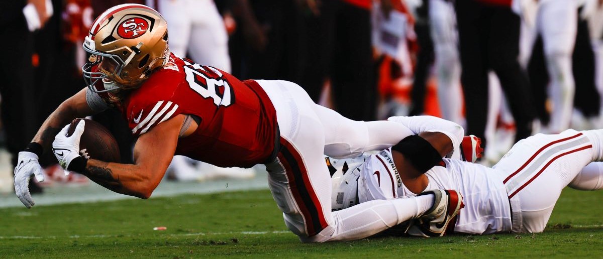 George Kittle #85 of the San Francisco 49ers makes a catch during the game against the Arizona Cardinals at Levi's Stadium on October 6, 2024 in Santa Clara, California. The Cardinals defeated the 49ers 24-23.