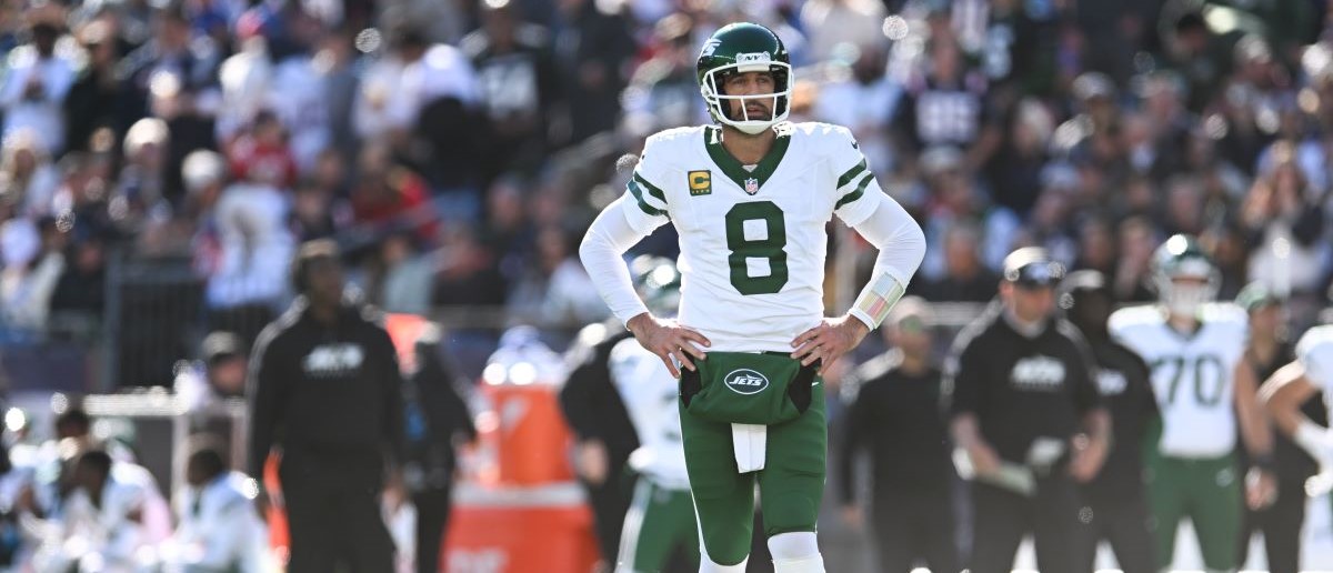 Aaron Rodgers #8 of the New York Jets stands on the field against the New England Patriots in the first quarter at Gillette Stadium on October 27, 2024 in Foxborough, Massachusetts