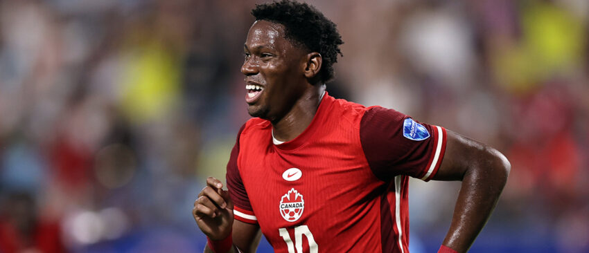 Jonathan David of Canada celebrates after scoring the team's second goal during the CONMEBOL Copa America 2024 third place match between Uruguay and Canada at Bank of America Stadium on July 13, 2024 in Charlotte, North Carolina.