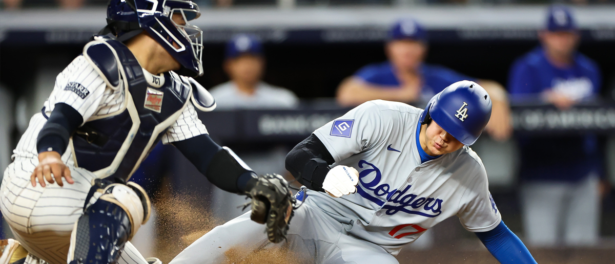 Shohei Ohtani #17 of the Los Angeles Dodgers slides safely into home plate against the New York Yankees during the eighth inning at Yankee Stadium on June 09, 2024 in the Bronx borough of New York City.