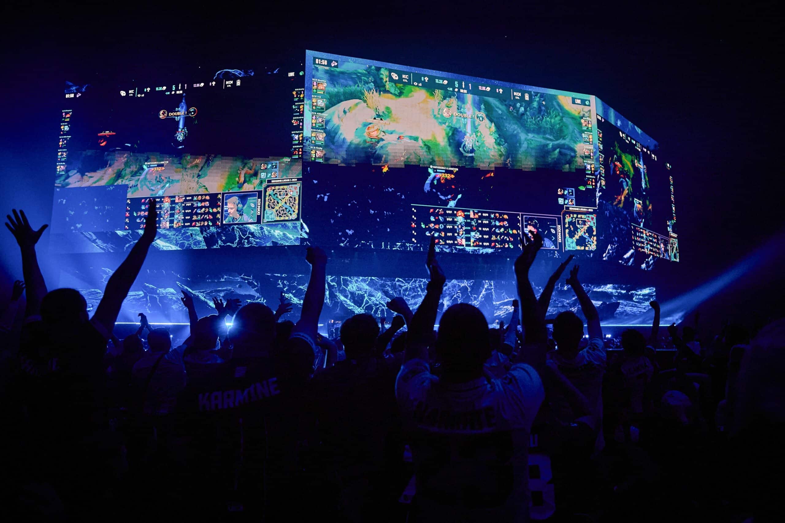 Karmine supporters react during the 6.5-hour show of the fourth edition of KCX4: Forever Rivals of Karmine Corp event at Paris La Defense Arena in Nanterre on November 9, 2024. 