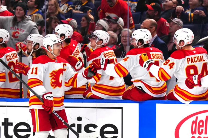 Mikael Backlund of the Calgary Flames celebrates his third period goal against the Buffalo Sabres during an NHL game on November 9, 2024 at KeyBank Center in Buffalo, New York.