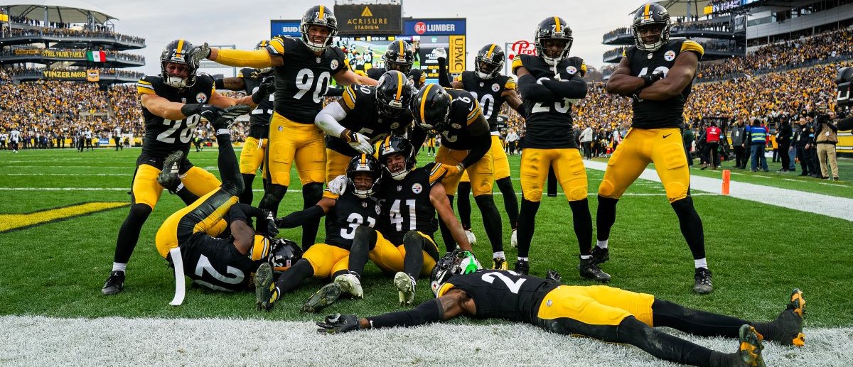 The Pittsburgh Steelers defense poses for the camera after making an interception during the regular season NFL football game between the Baltimore Ravens and Pittsburgh Steelers on November 17, 2024 at Acrisure Stadium in Pittsburgh, PA