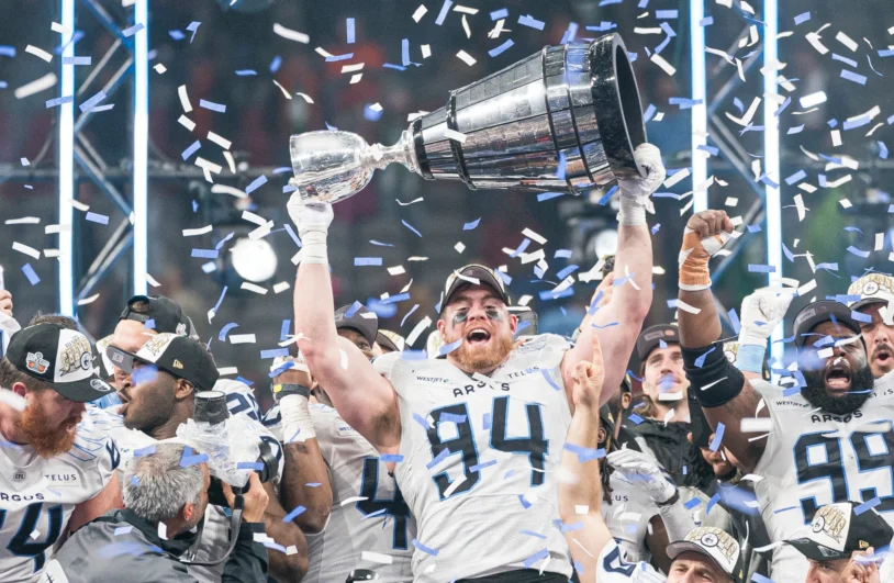 Jake Ceresna #94 of the Toronto Argonauts lifts the Grey Cup after defeating the Winnipeg Blue Bombers in the 2024 Grey Cup at BC Place on November 17, 2024 in Vancouver, Canada. 