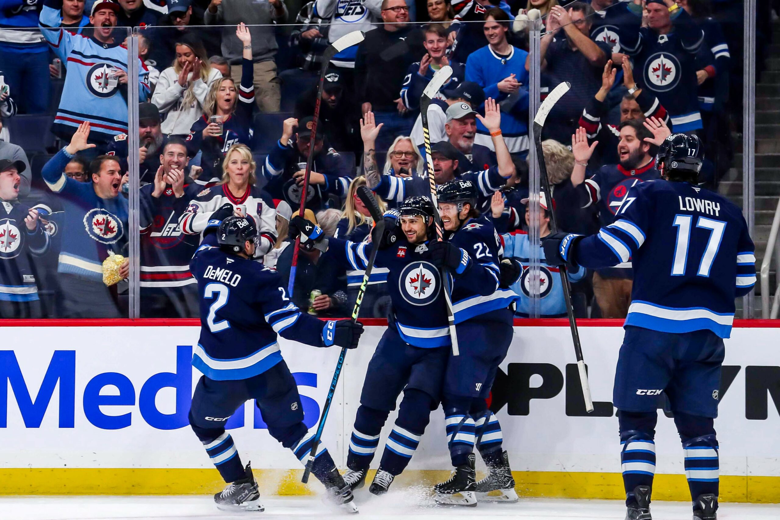 Dylan DeMelo, Nino Niederreiter, Mason Appleton and Adam Lowry of the Winnipeg Jets celebrate a third period goal against the Utah Hockey Club at the Canada Life Centre on November 5, 2024 in Winnipeg, Manitoba, Canada.